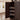 Wooden 5 Tier cabinet with open door showing adjustable shelves in a room with a window.