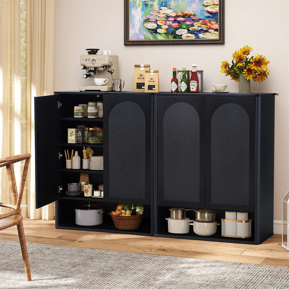 Black storage cabinet with kitchen items in a room with a painting and flowers on the wall.