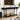 Black console table in a living room with decor items and a TV above.