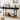 Black 63" console table with decorative items in a living room setting