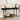 Black console table with decorative items in a room setting