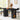 Black dining table with shelves in a room with large windows and decorative elements.