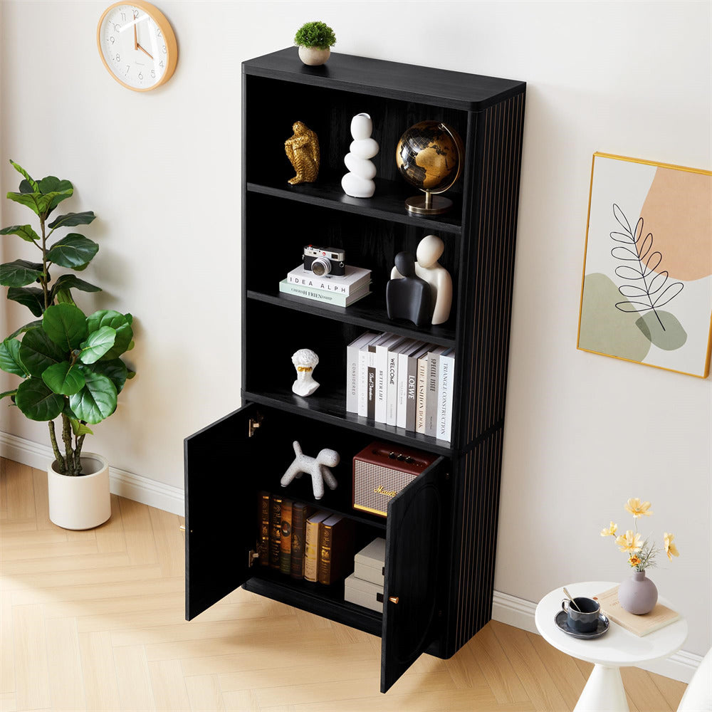 Black bookshelf with decorative items in a room with a plant and wall art.