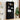 Black bookshelf with decorative items in a room with a plant and wall art.