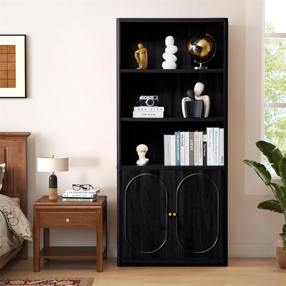 Black bookshelf with decorative items in a room with a bed and side table.