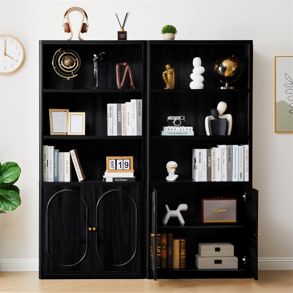 Black bookshelf with decorative items against a white wall