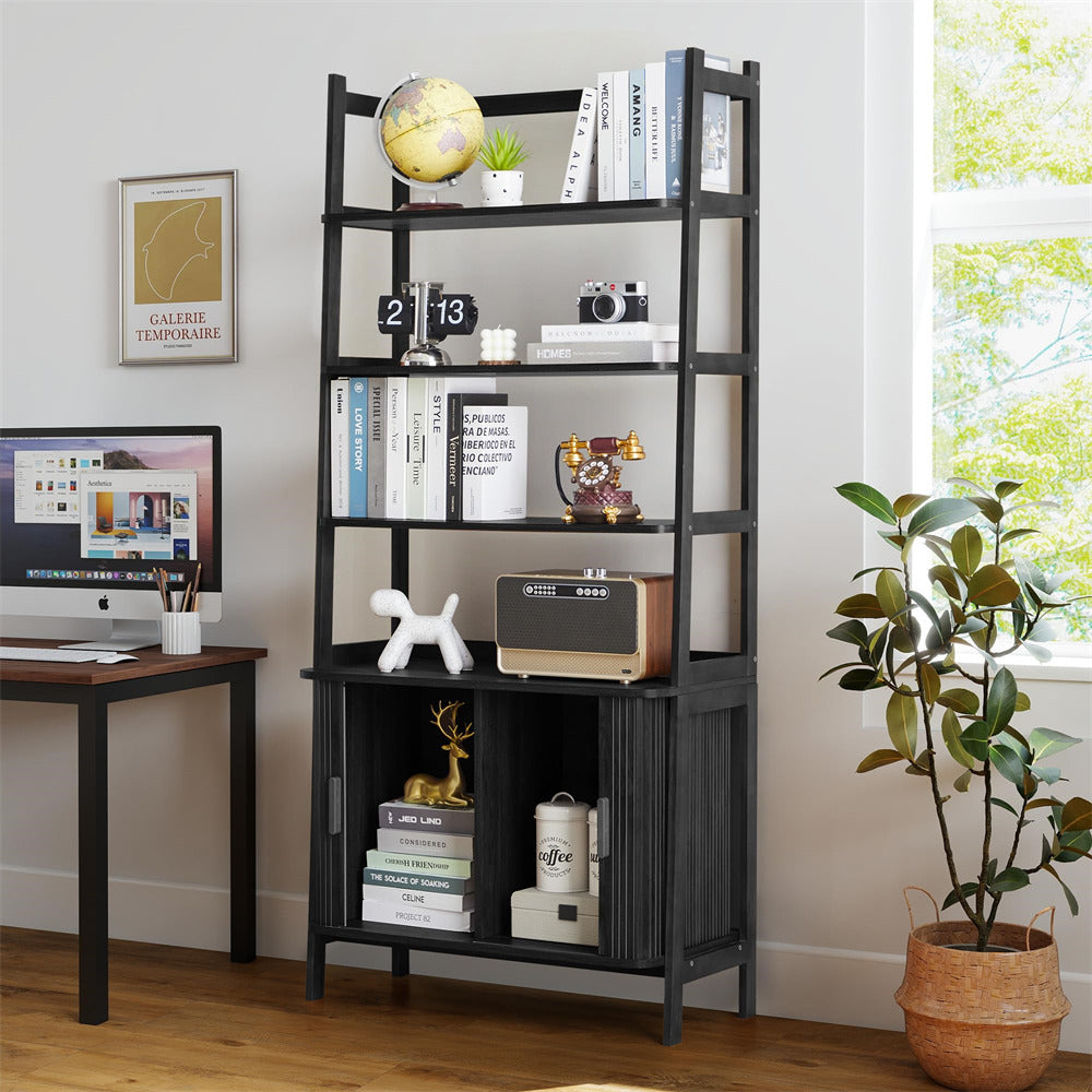 Black bookshelf with decorative items in a room with a desk and window.