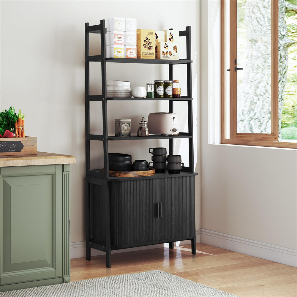 Black shelving unit with various items in a room with a window and green cabinet.