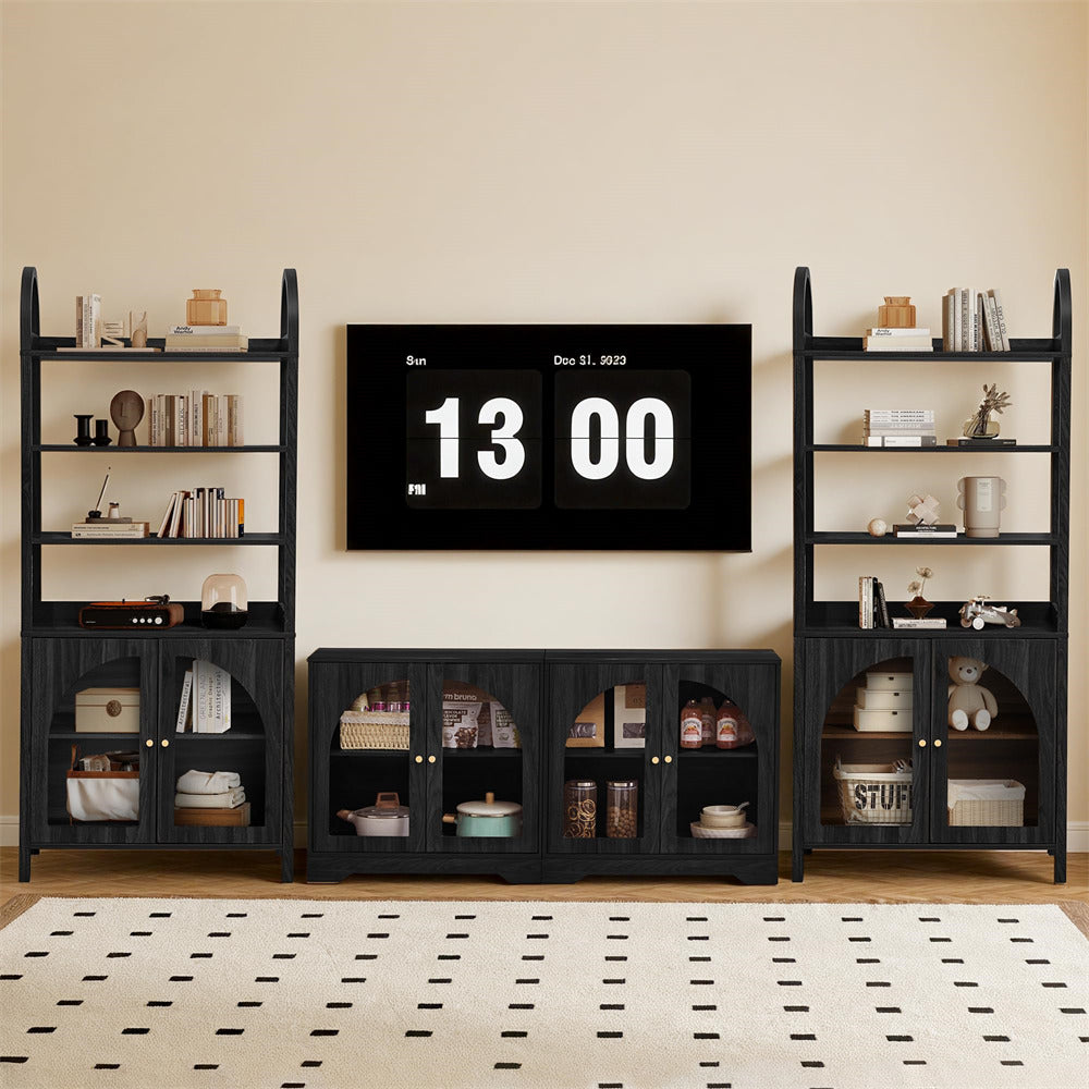 Black shelving units with decorative items against a beige wall with a digital clock.