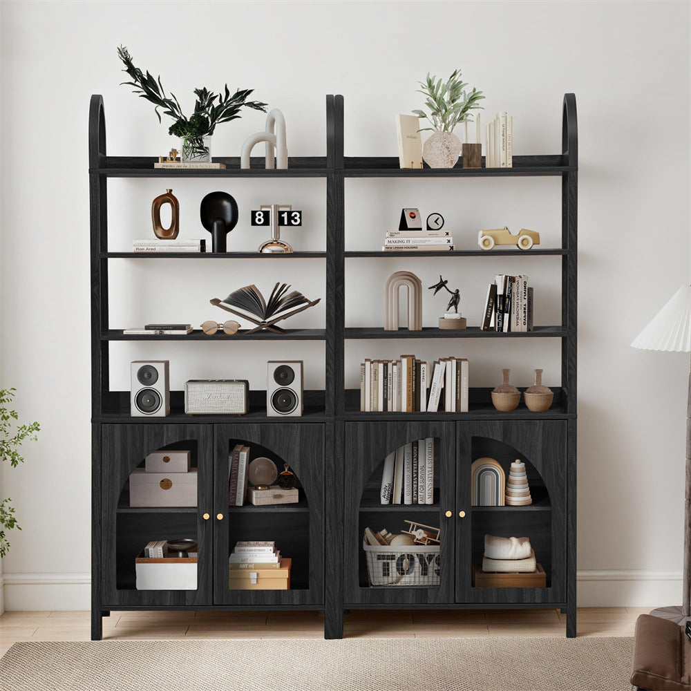 Black bookshelf with decorative items in a room setting