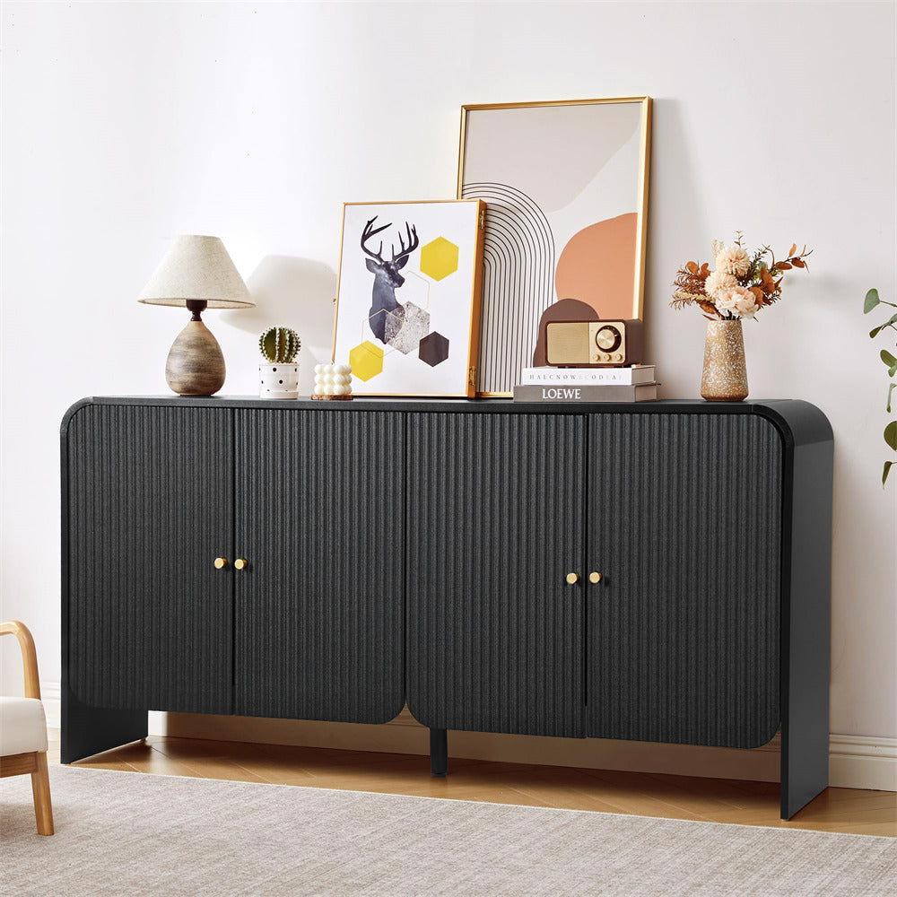 Black sideboard with decorative items in a room setting