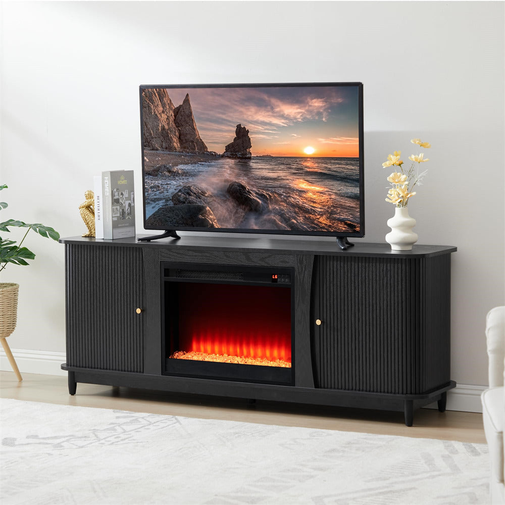 Black TV stand with electric fireplace displaying a scenic image on a television.