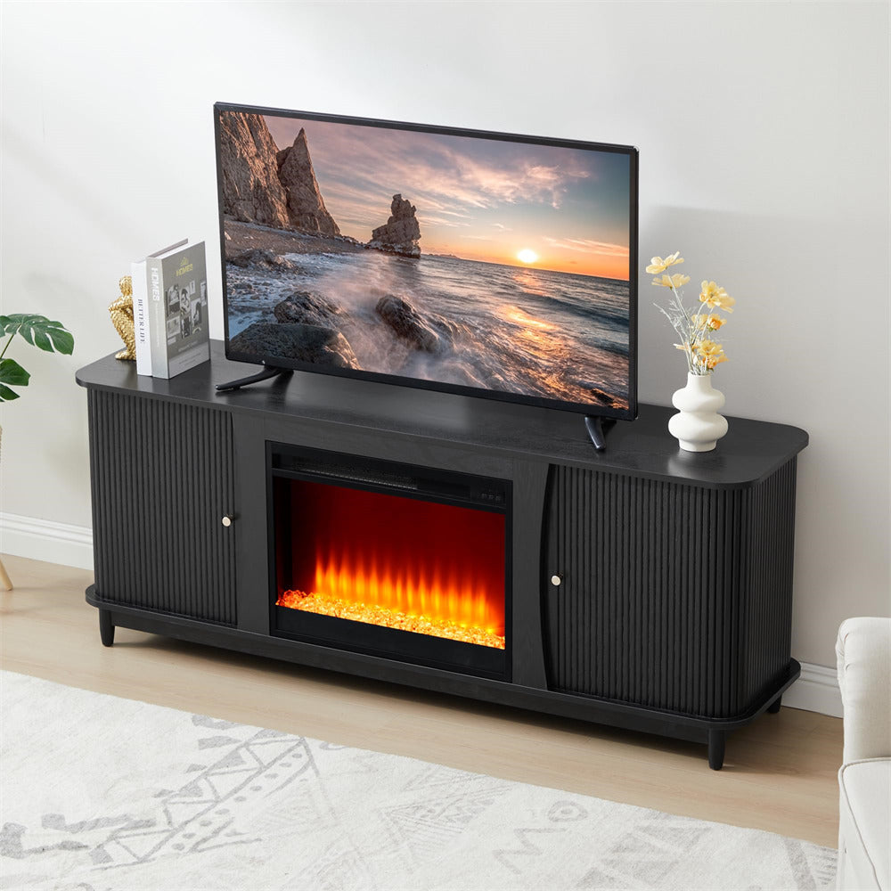 Black TV stand with electric fireplace and TV displaying a scenic sunset.