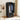 Black portable wardrobe with clothes inside in a room setting