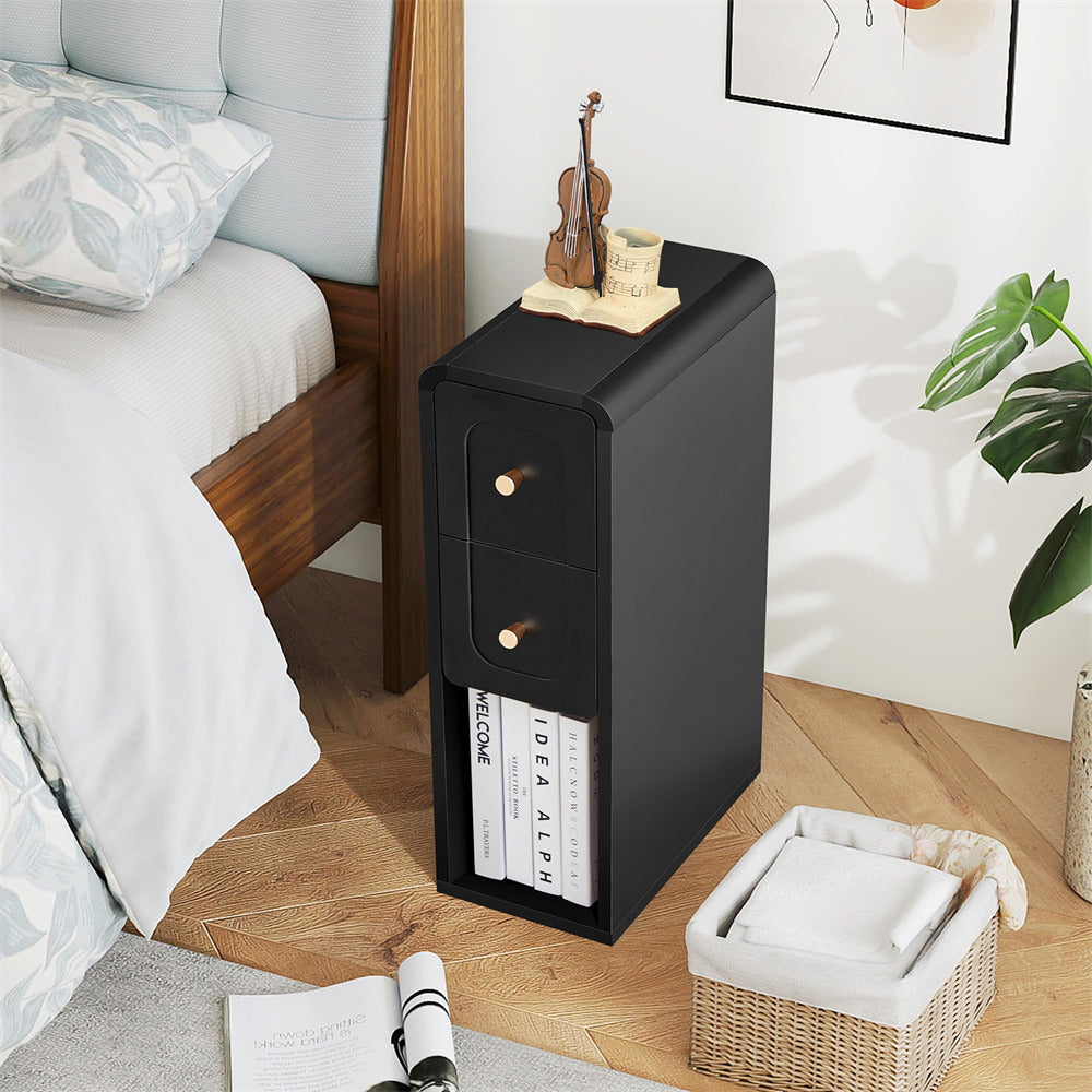 Black nightstand with two drawers next to a bed in a bedroom setting.