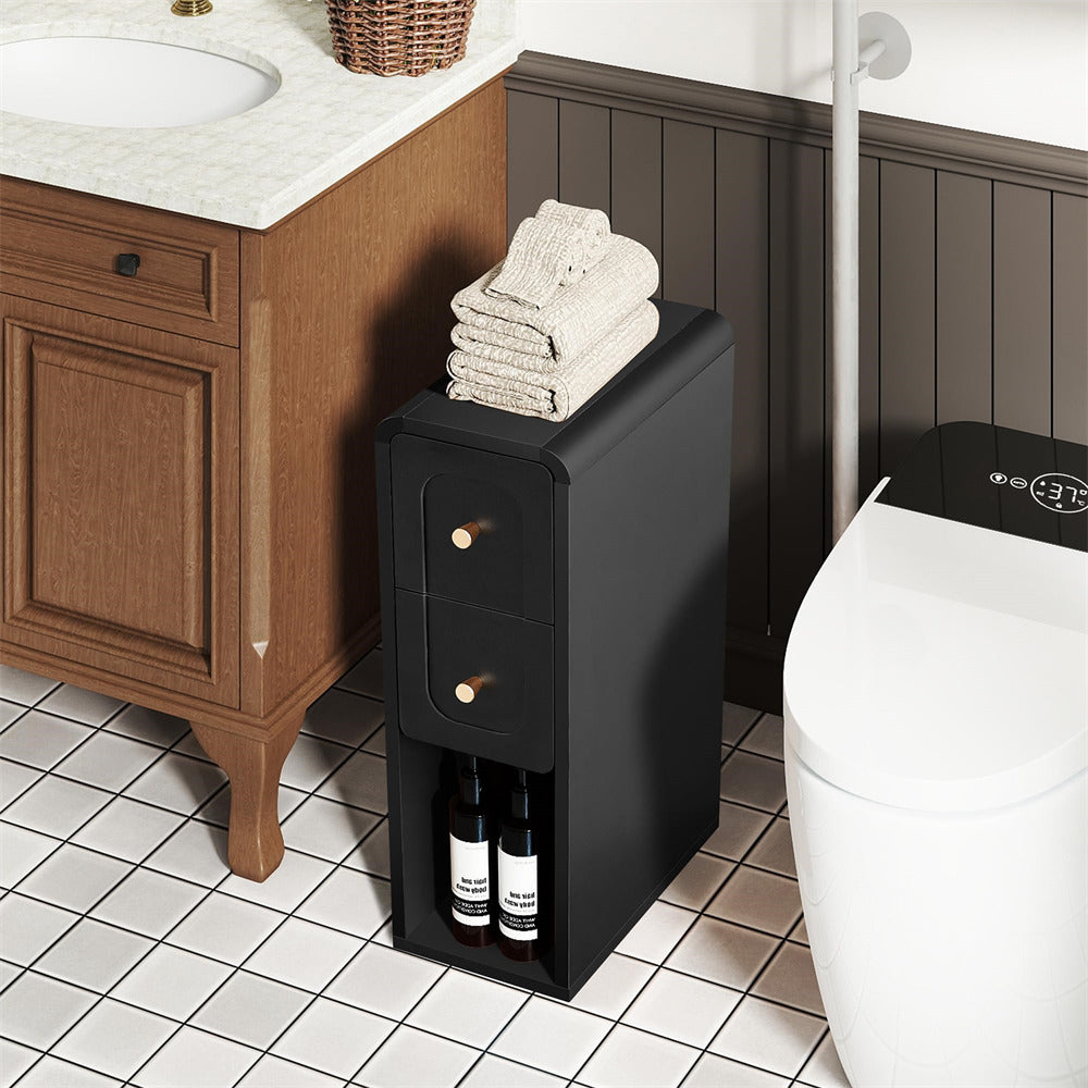 Bathroom with wooden vanity, black storage cabinet, and white toilet.