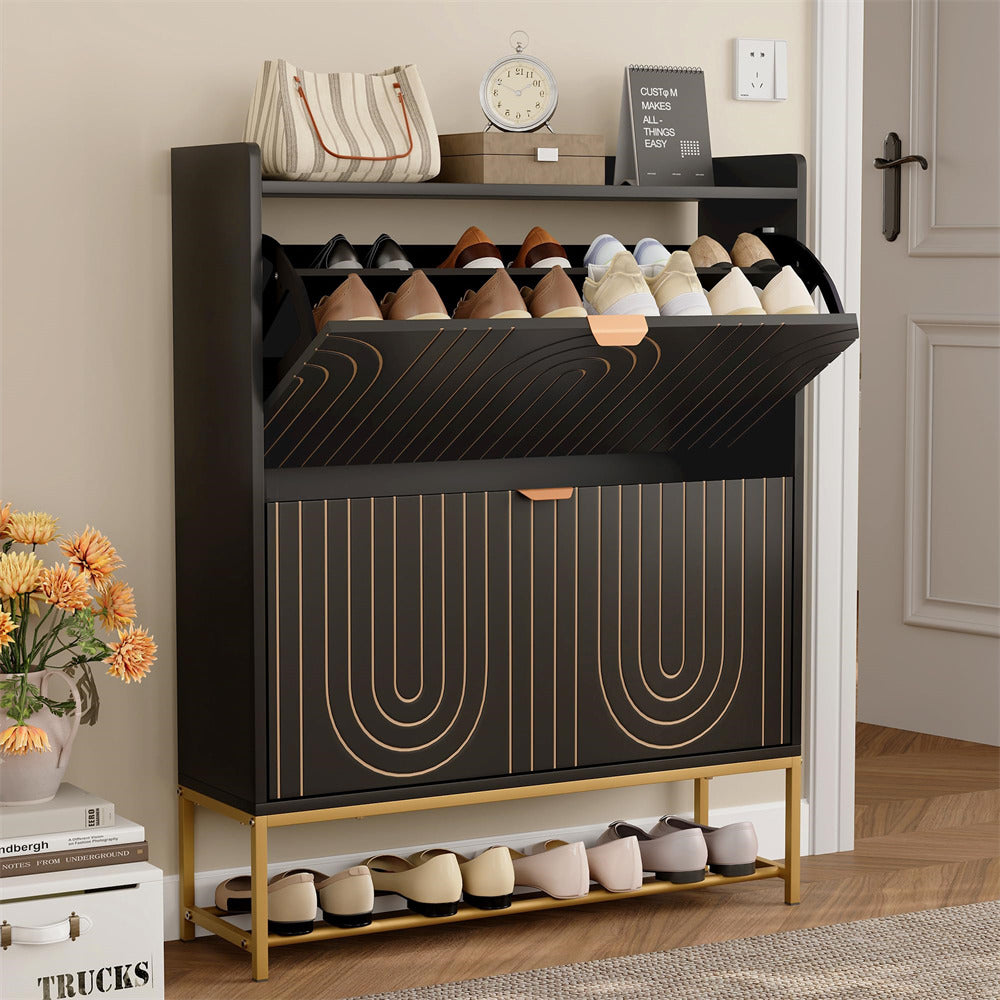Black shoe cabinet with open door displaying shoes, placed in a room with a clock and flowers.