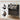 Black shoe cabinet with adjustable shelves and decorative items on a light background