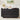 Black 6-drawer dresser with decorative items in a room setting
