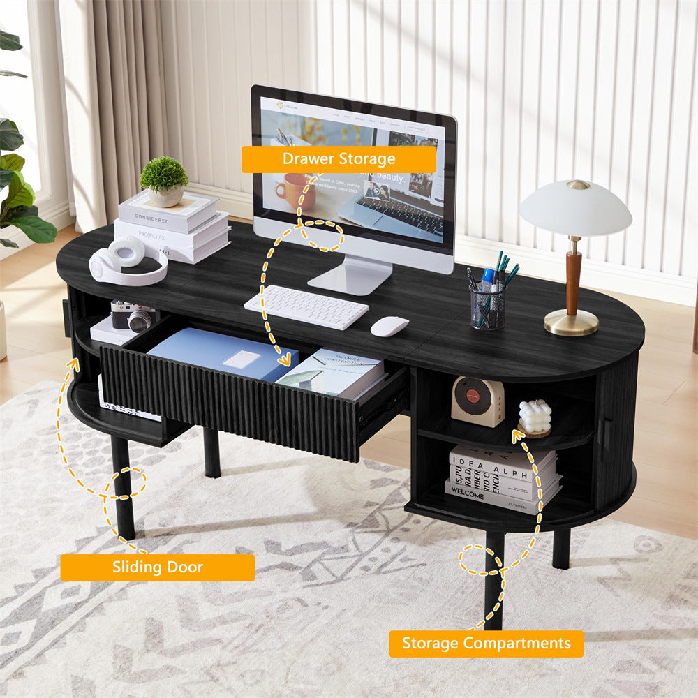 Black L-shaped desk with computer setup, storage compartments, and sliding door in a room setting.