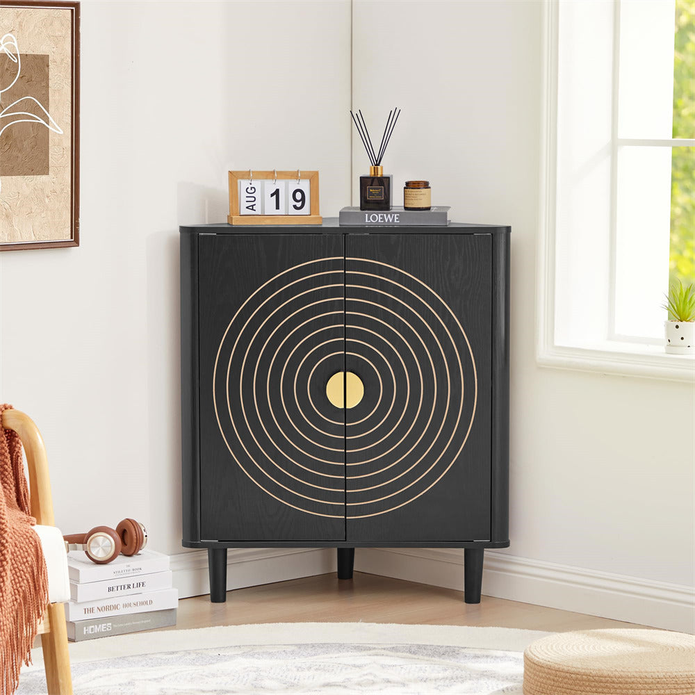 Black cabinet with gold circular design in a room with a window and decor items.