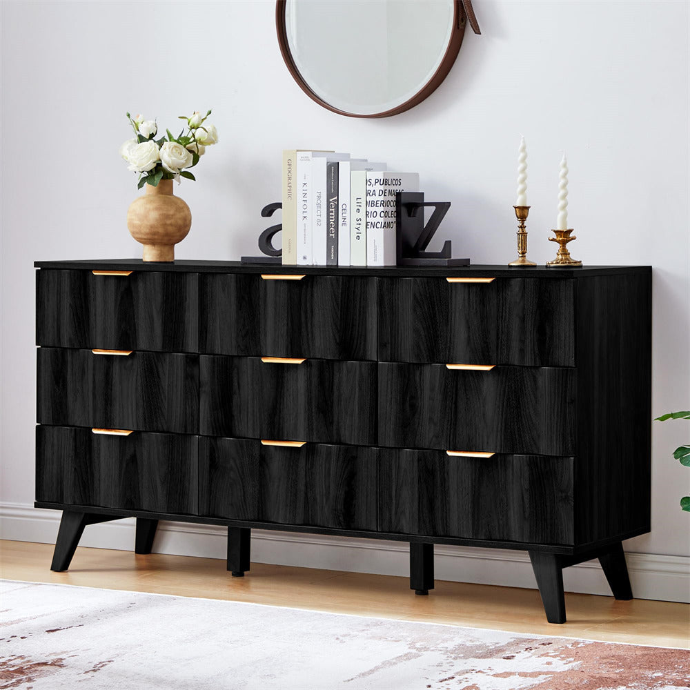 Black dresser with decorative items in a room setting