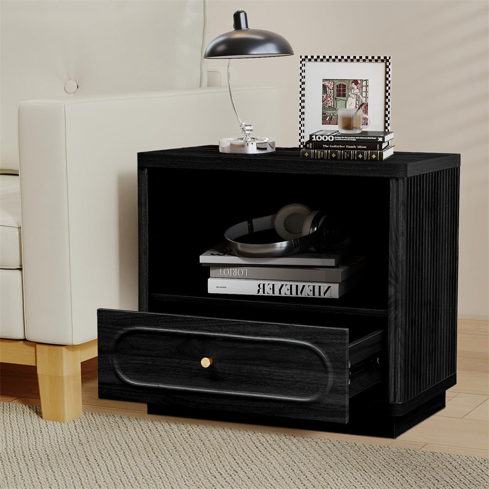 Black nightstand with a drawer in a room setting