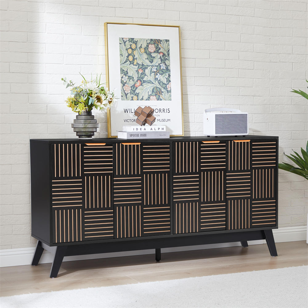 Black patterned sideboard with decorative items against a white brick wall.
