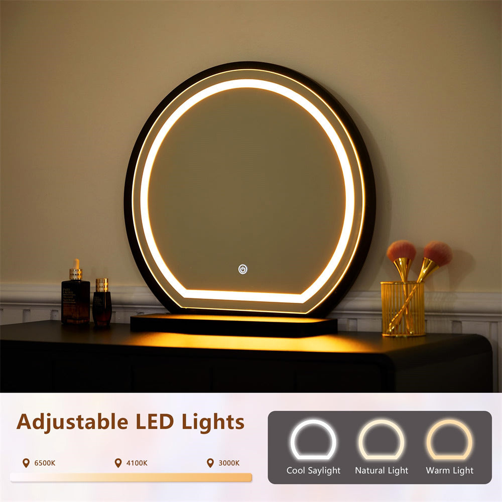 Round LED mirror with adjustable light settings on a table against a beige wall.