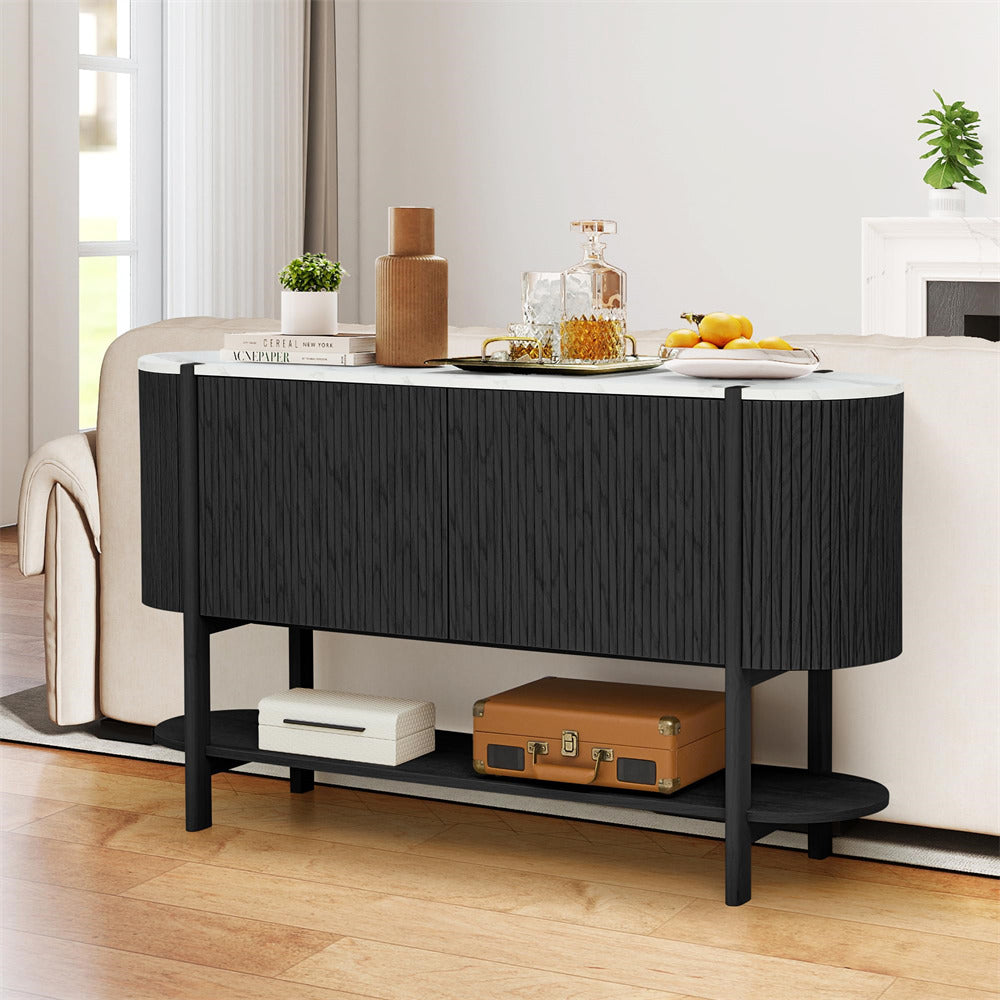 Black console table with decorative items in a living room setting