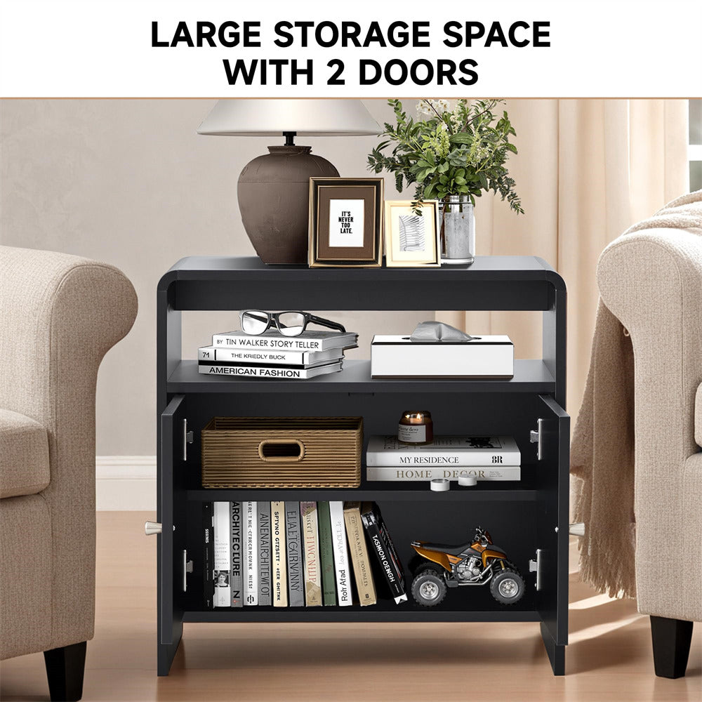Black storage shelf with books, decor items, and a toy quad bike in a living room setting.