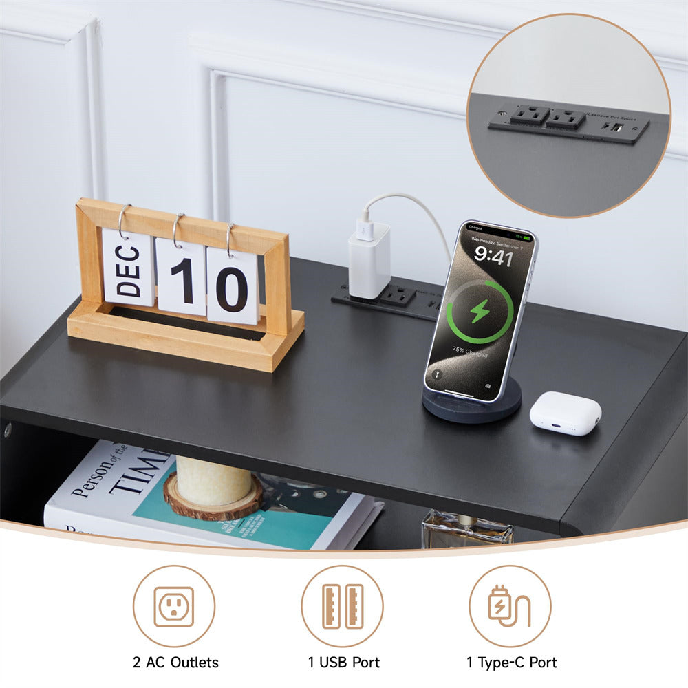 Desk setup with phone charging, power outlets, and USB port on a white wall background