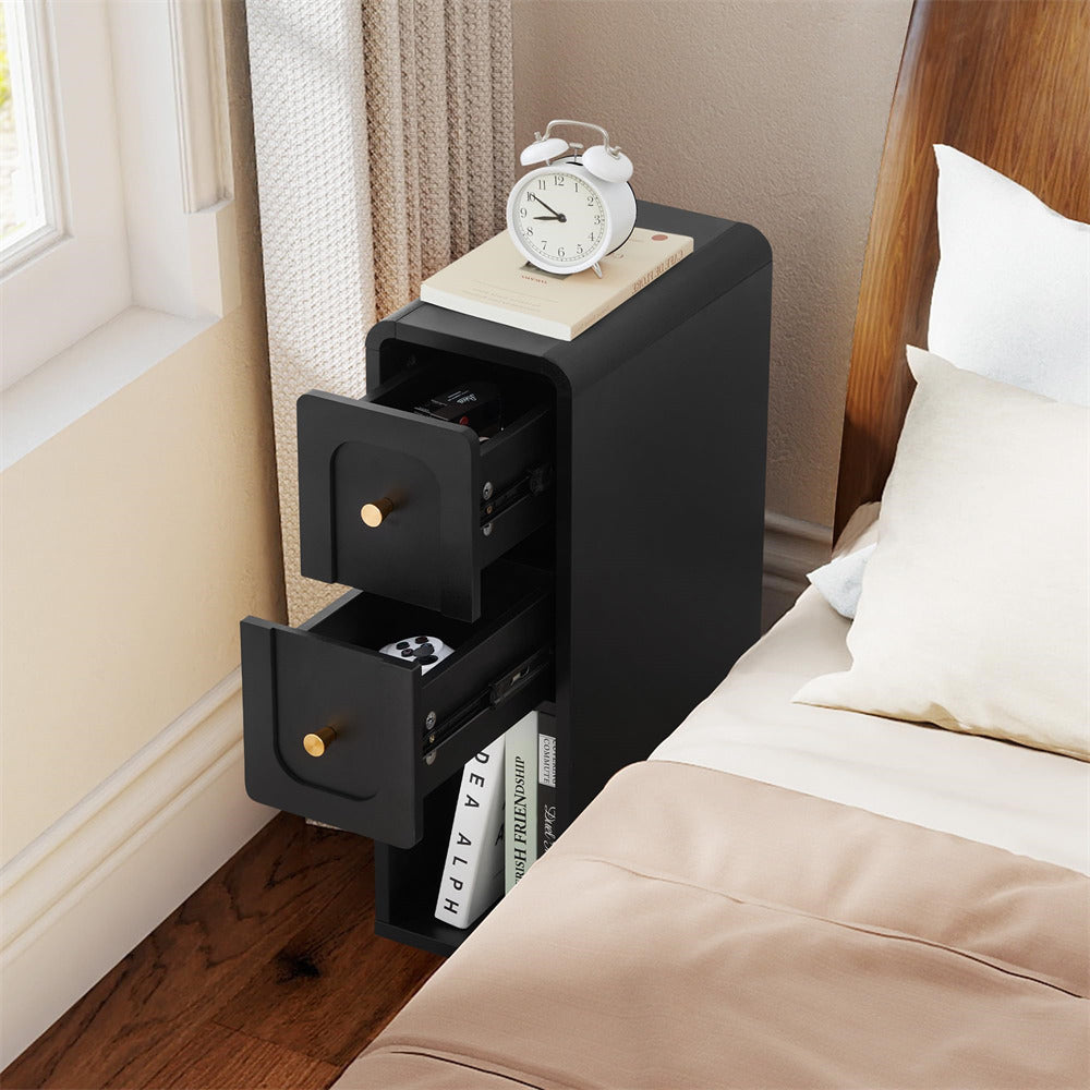 Black nightstand with open drawers next to a bed in a bedroom.