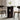 Round dark wood dining table with stools in a room with curtains and a plant.