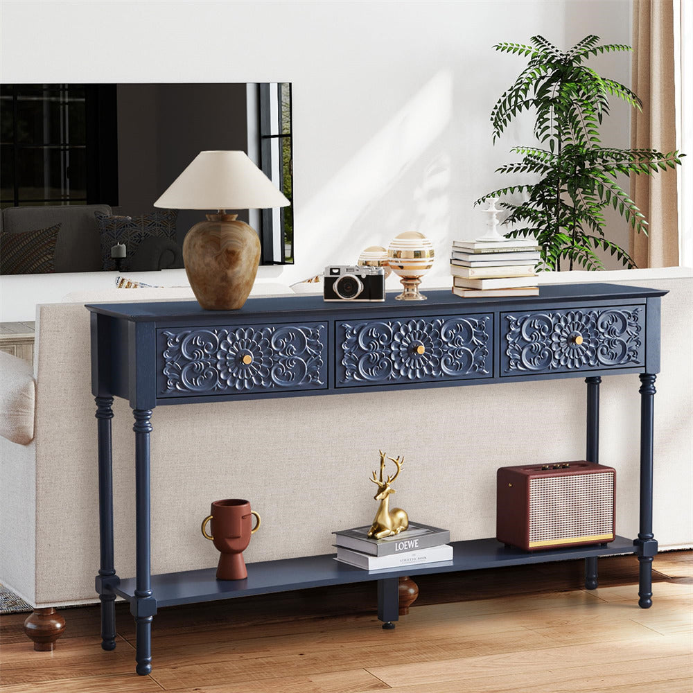 Decorative console table with ornate carvings in a living room setting