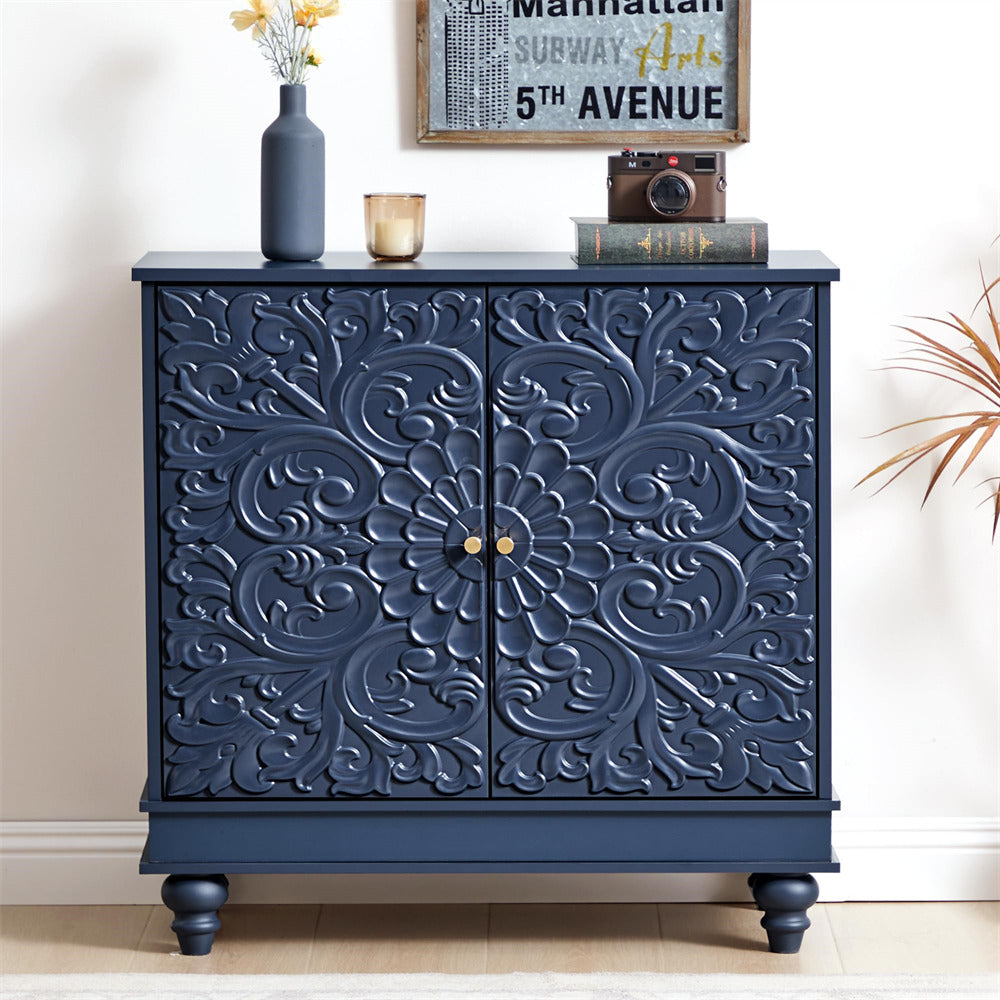 Decorative blue cabinet with intricate carvings on a light-colored floor.