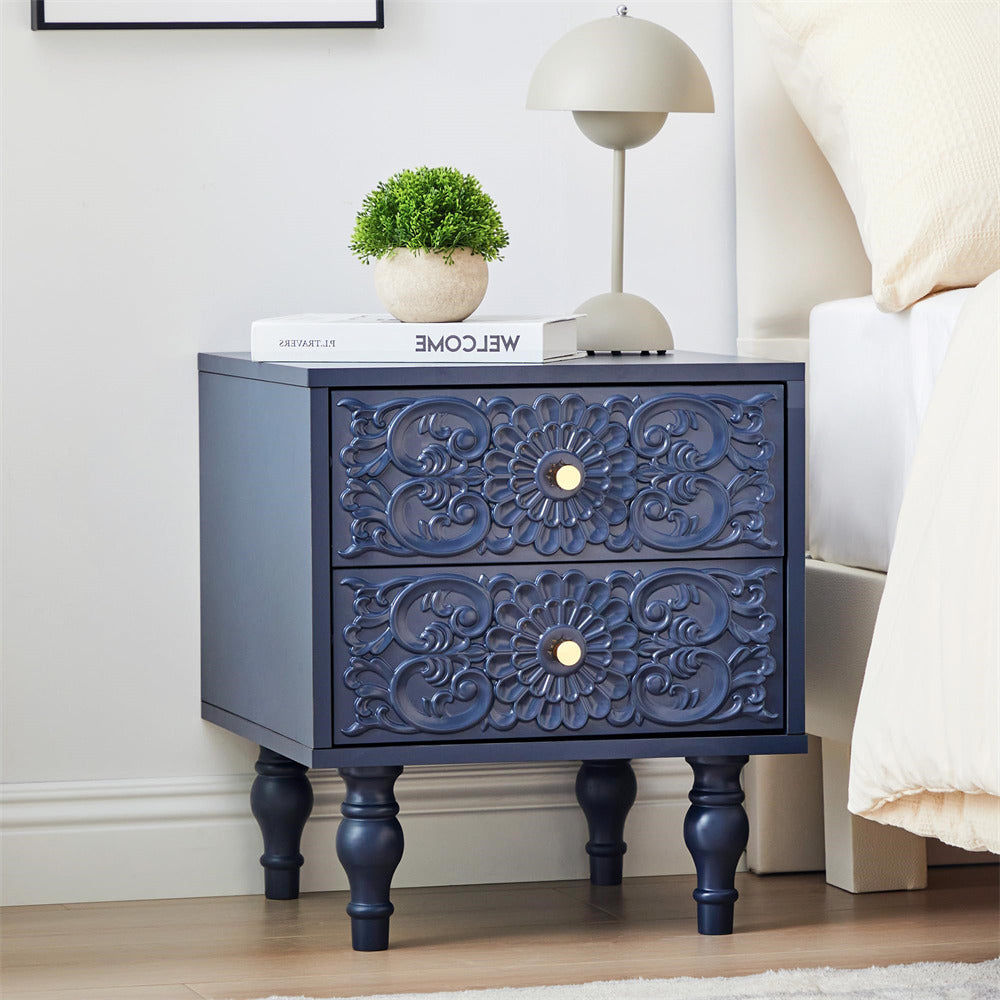 Navy blue nightstand with floral patterns in a bedroom setting