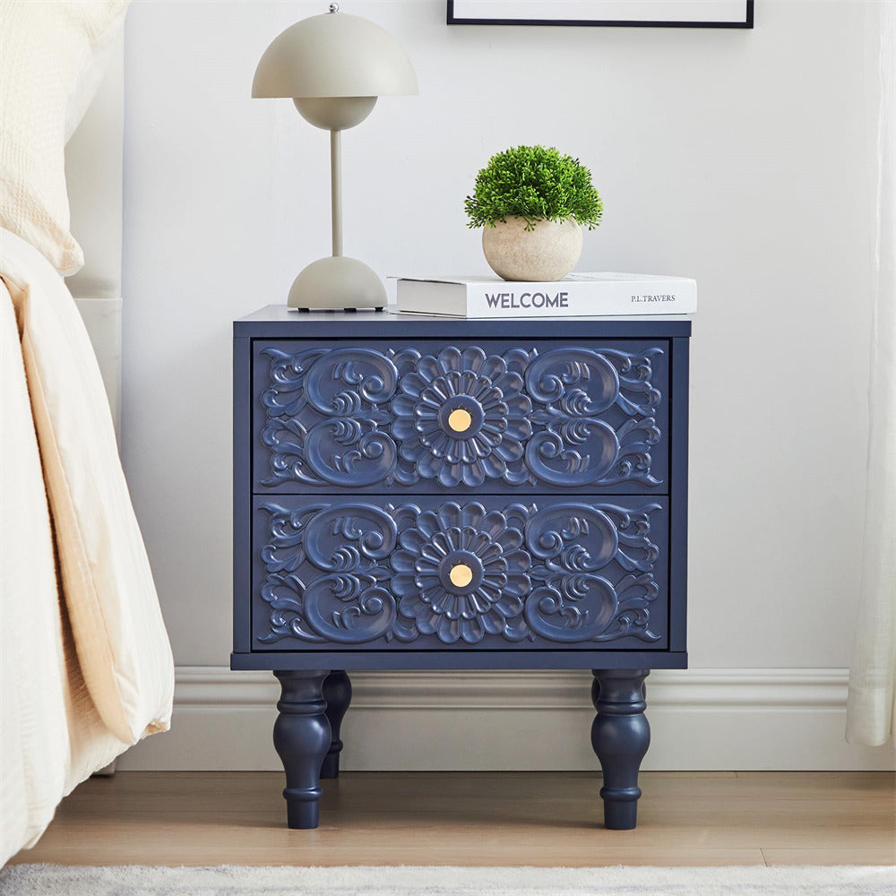 Navy blue nightstand with decorative patterns in a bedroom setting