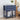 Navy blue nightstand with floral patterns, books, and a vase in a bedroom setting.