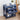 Blue nightstand with decorative elements in a bedroom setting