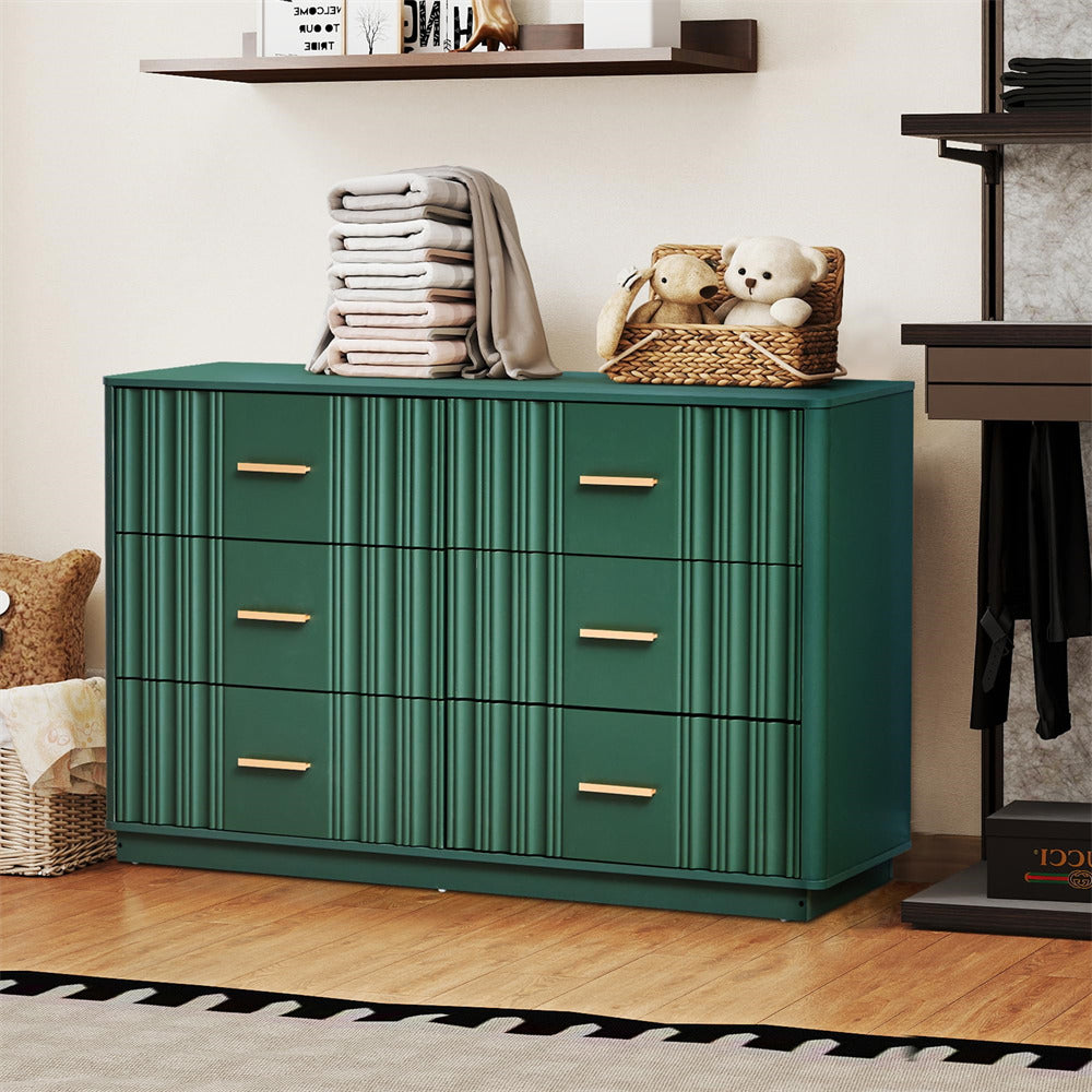 Green 6 drawers dresser with gold handles in a room setting