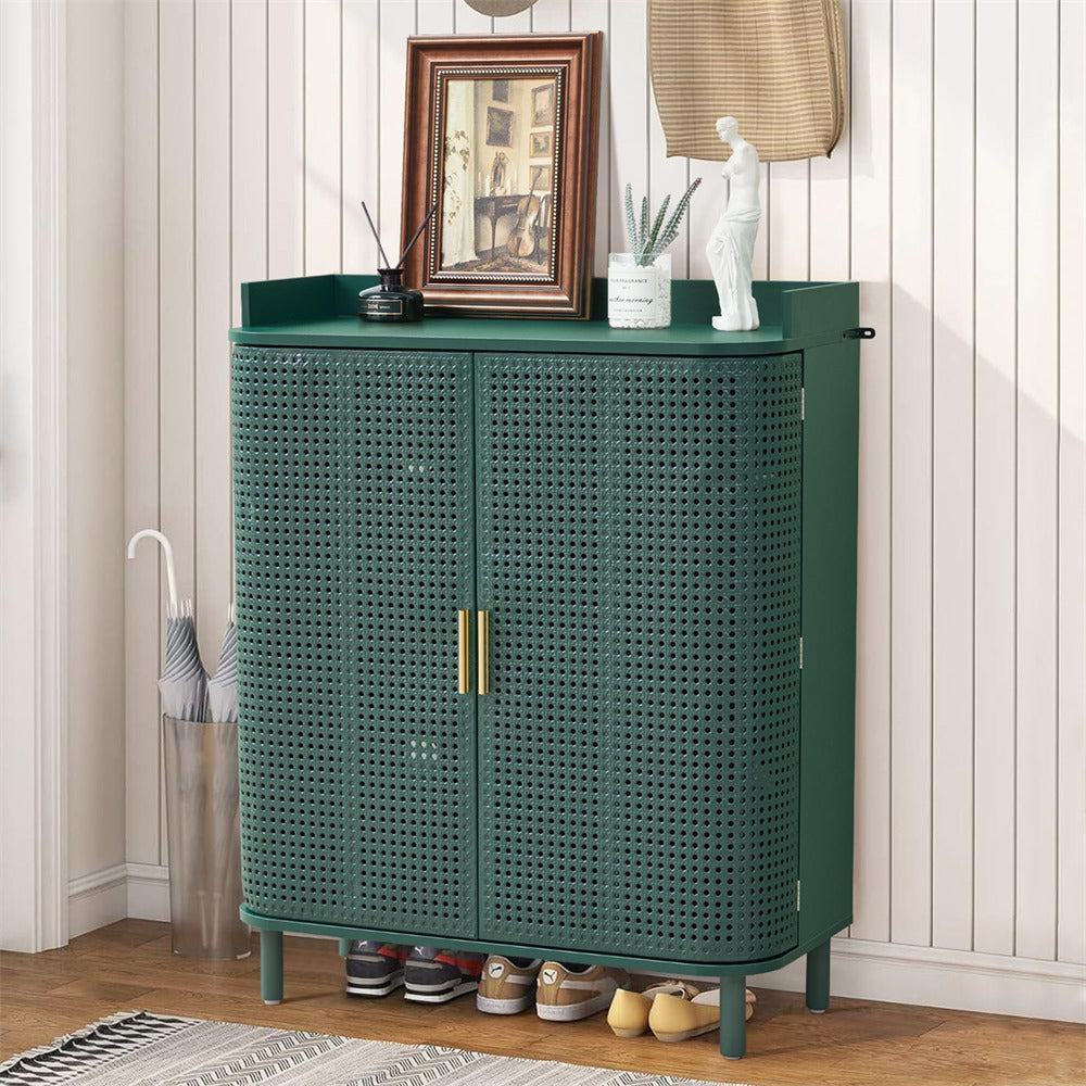 Green woven cabinet with decorative items on a wooden floor.