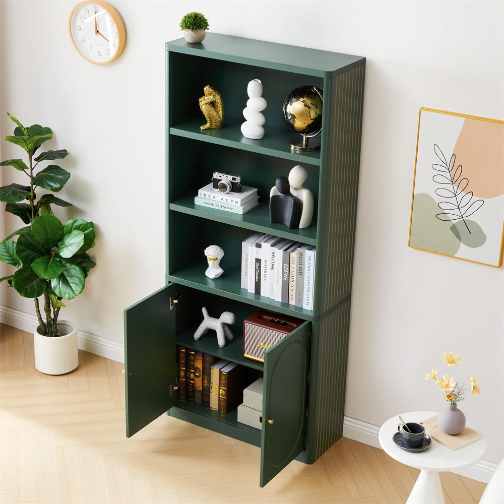 Green bookshelf with decorative items in a room with a plant and wall art.