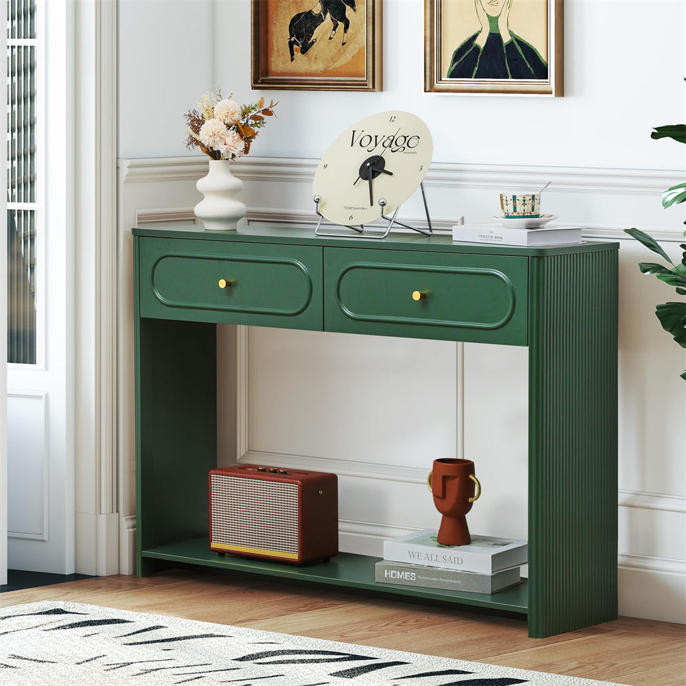 Green console table with decorative items in a room setting