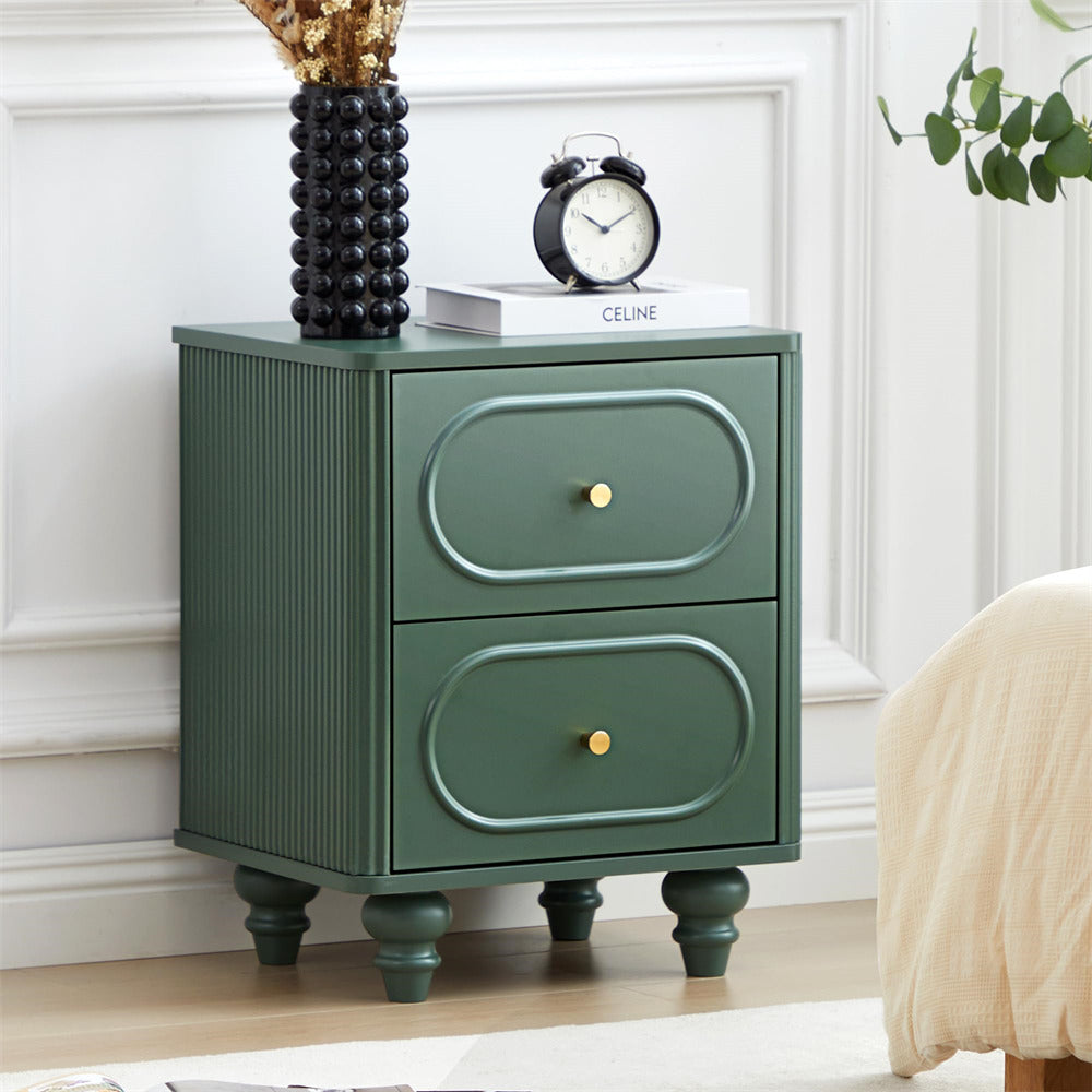 Green nightstand with two drawers in a bedroom setting