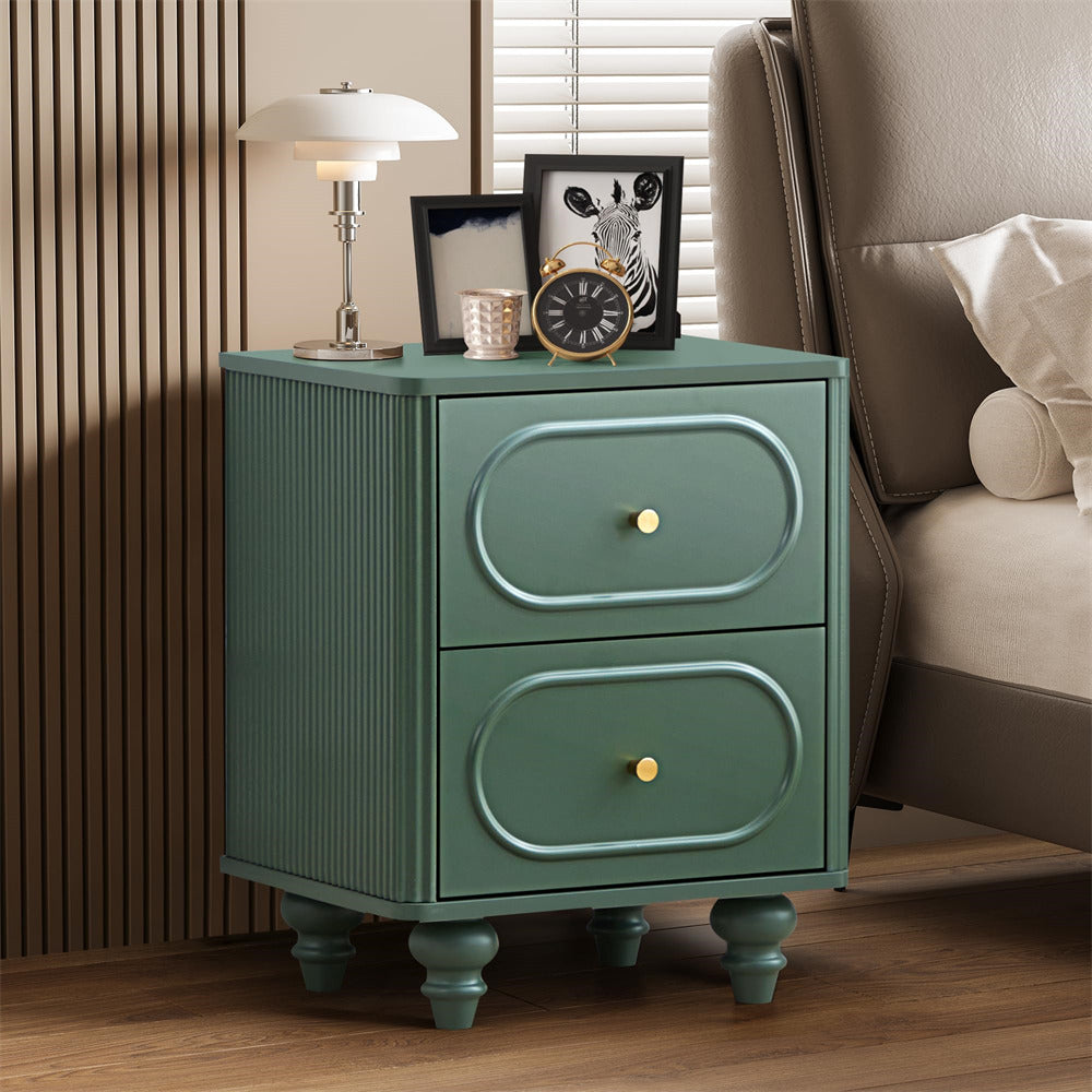 Green nightstand with two drawers in a bedroom setting
