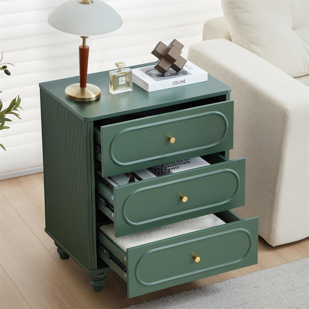 Green nightstand with three drawers in a living room setting.