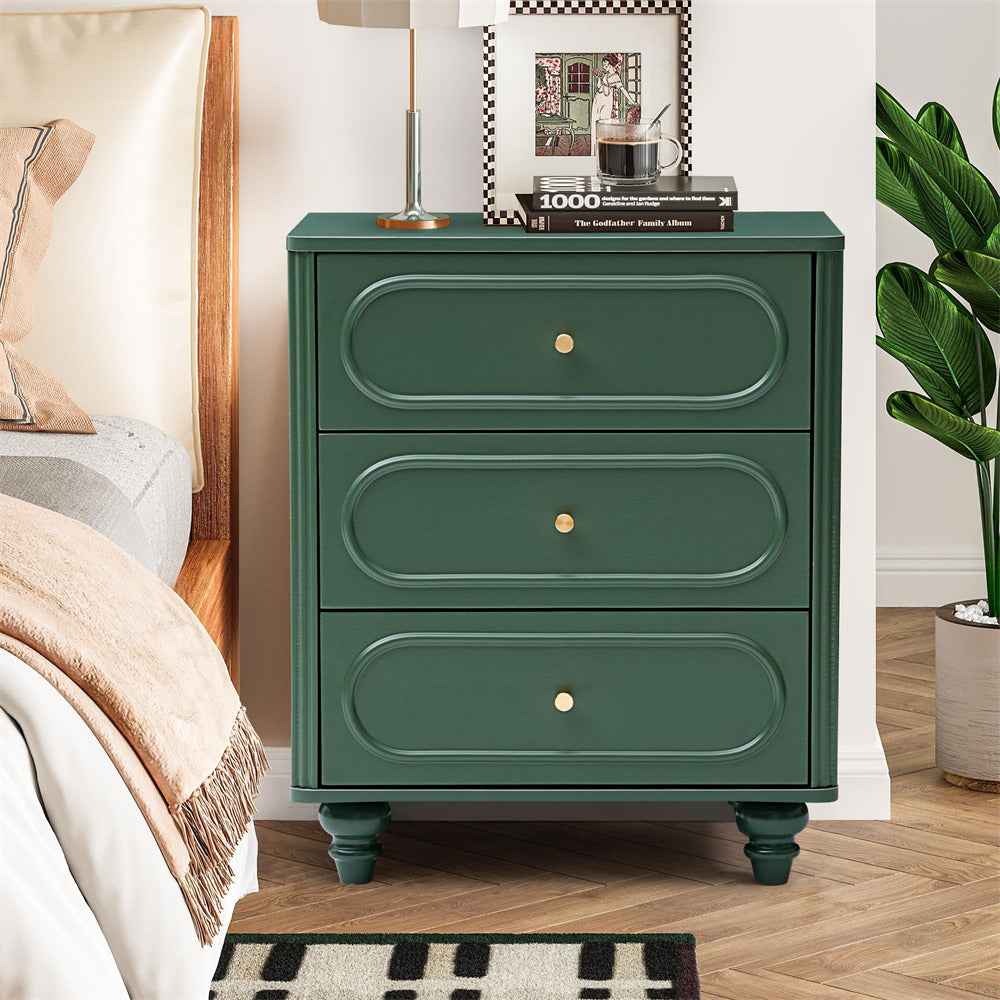 Green nightstand with three drawers in a bedroom setting