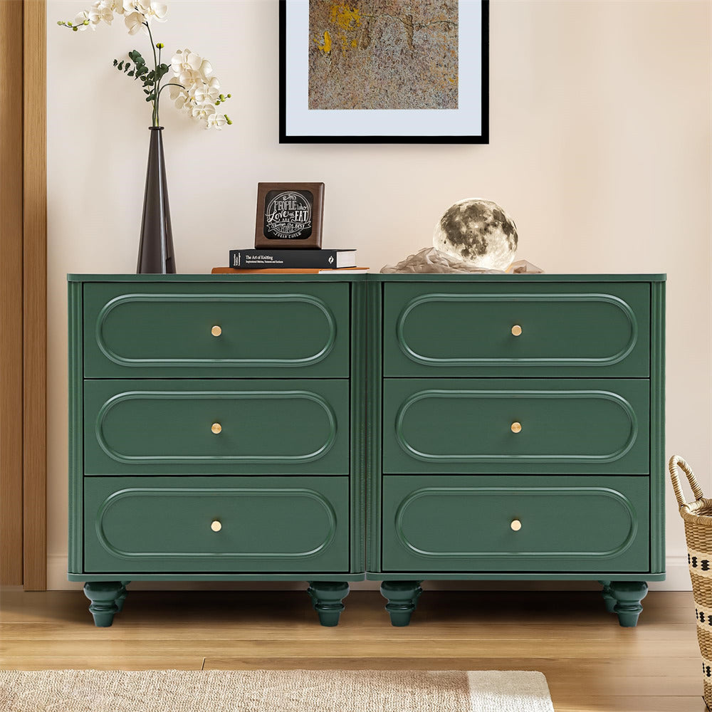 Green dresser with four drawers in a room setting.