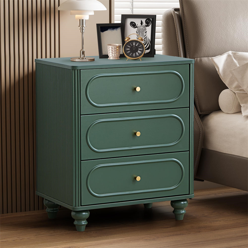 Green nightstand with three drawers in a bedroom setting